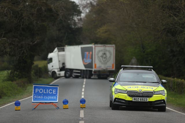 A police cordon on the A5 outside Aughnacloy, Co Tyrone (Liam McBurney/PA)
