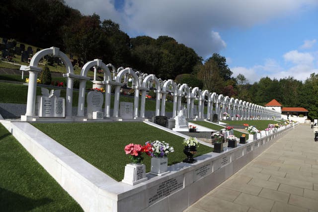The graves of the victims of the Aberfan disaster in the village’s cemetery in Wales (PA)