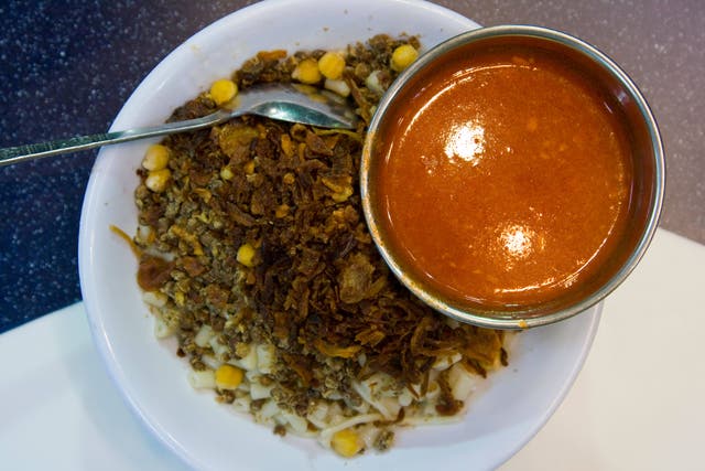 Cooks offer authentic cuisine such as traditional Egyptian dish Koshari (Jeremy Graham / Alamy/PA)
