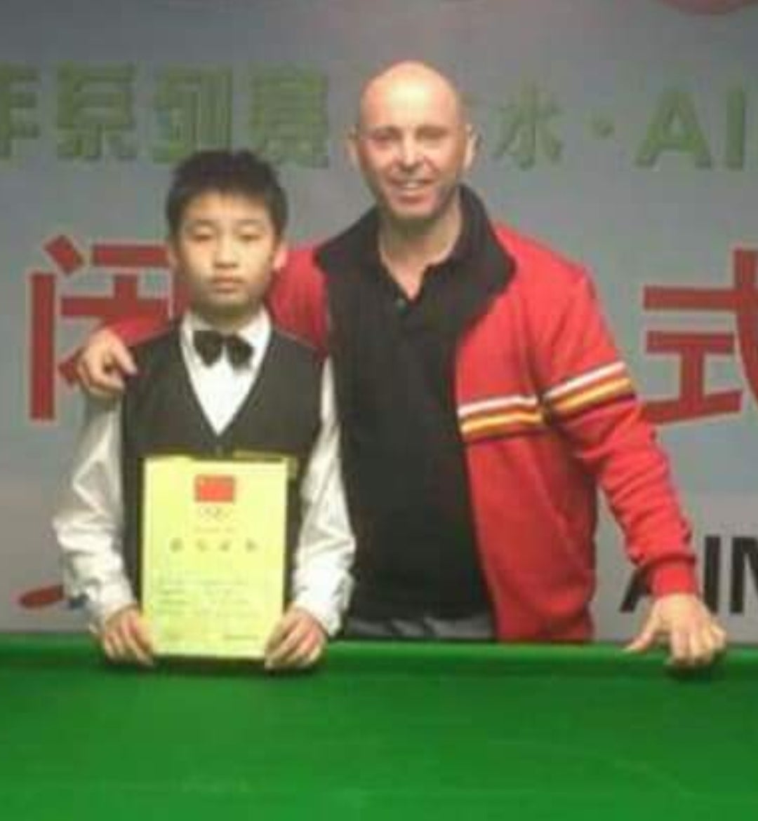 Si Jiahui pictured with his youth coach Roger Leighton