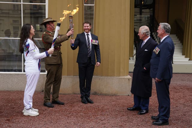 The King attends the start of the Australian Legacy Torch Relay at Buckingham Palace (Gareth Fuller/PA)