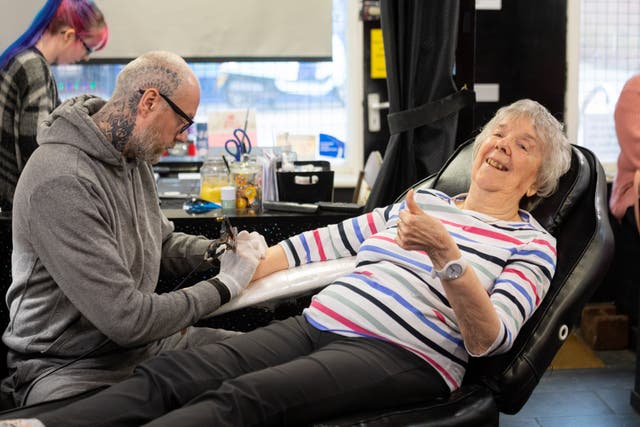 Helen Allen getting a tattoo (Care UK/ Shaun Fellows)