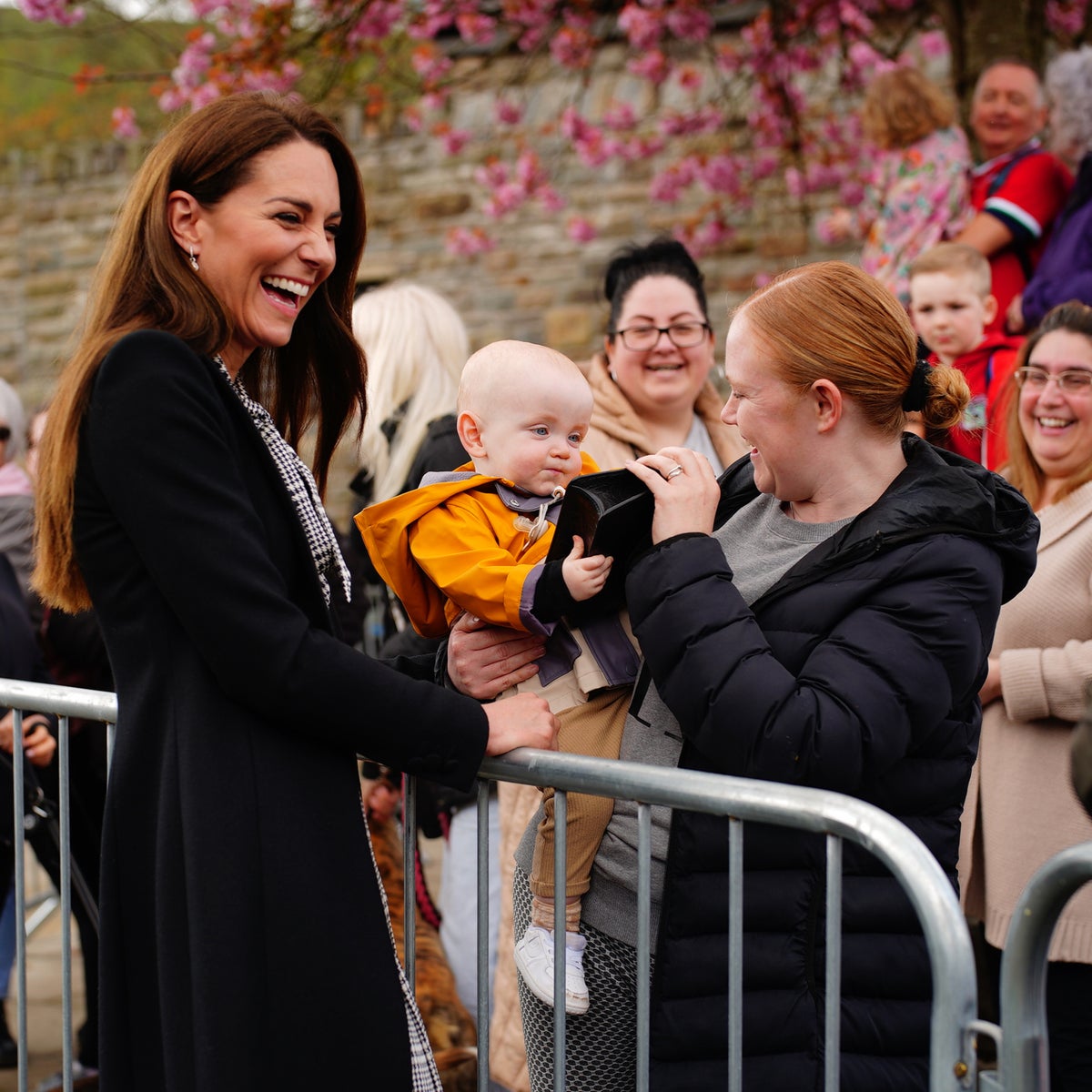 Video captures moment Kate Middleton lets baby play with her $845 handbag | The Independent