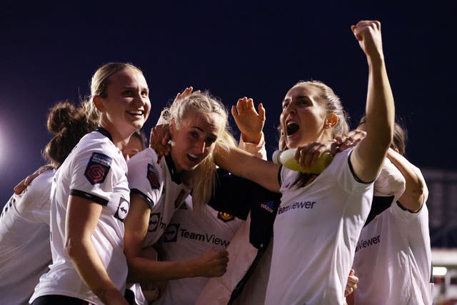 <p>Millie Turner of Manchester United celebrates a dramatic win</p>