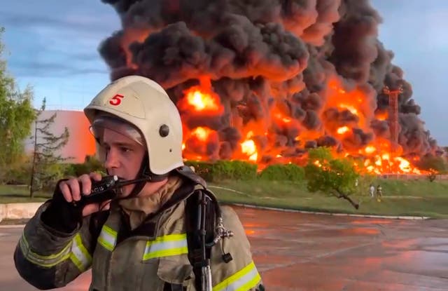 <p>Black smoke engulfs sky after suspected drone attack on Crimea oil depot</p>