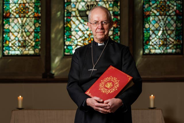 The Archbishop of Canterbury, Justin Welby, holding the Coronation Bible for King Charles III (PA)