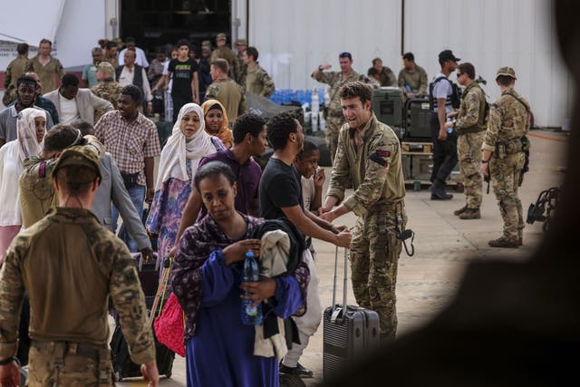 People are evacuated from Wadi Seidna in Khartoum (PO Phot Arron Hoare/PA)