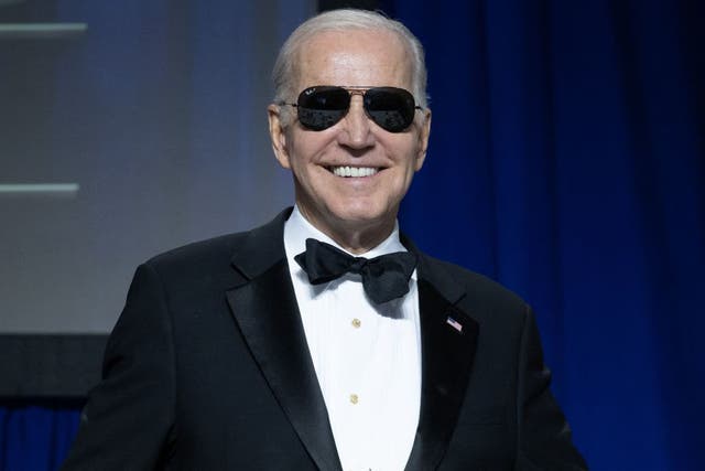 <p>Joe Biden poses with his trademark aviator sunglasses at Saturday’s White House Correspondents Dinner</p>