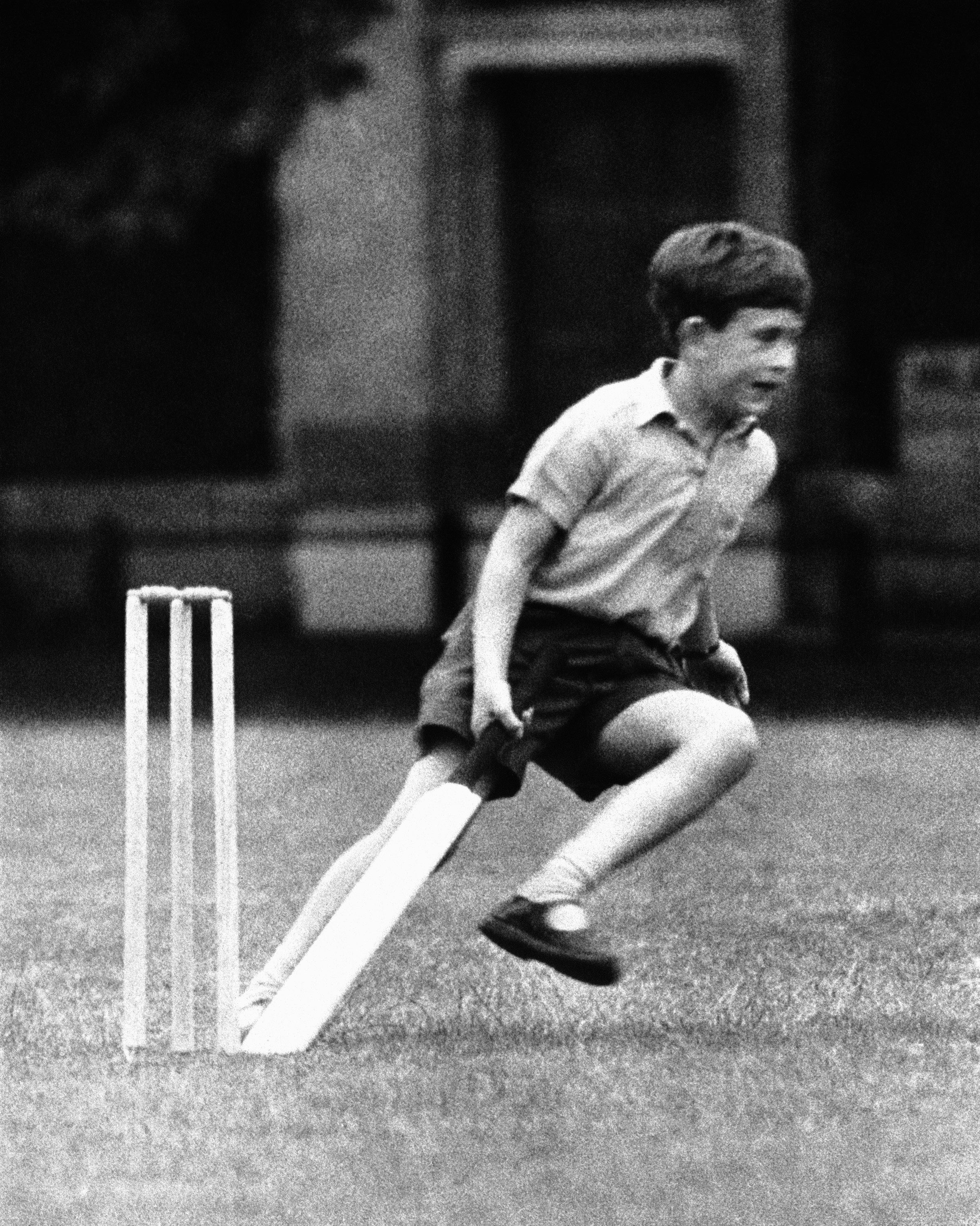 The then-Prince Charles playing cricket during a sports day at Hill House School, in London, 8 July 1957