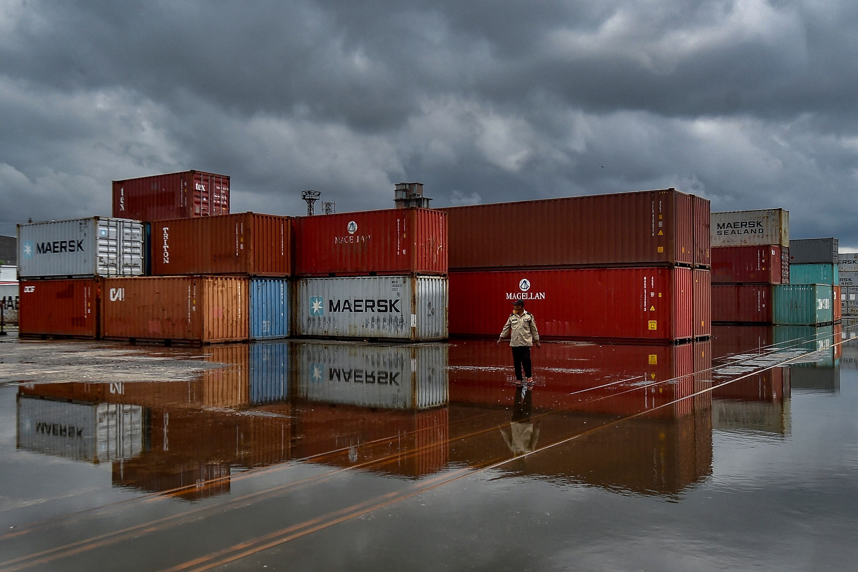 File: A security personnel walks in the premises of a Container Depot in Dhaka