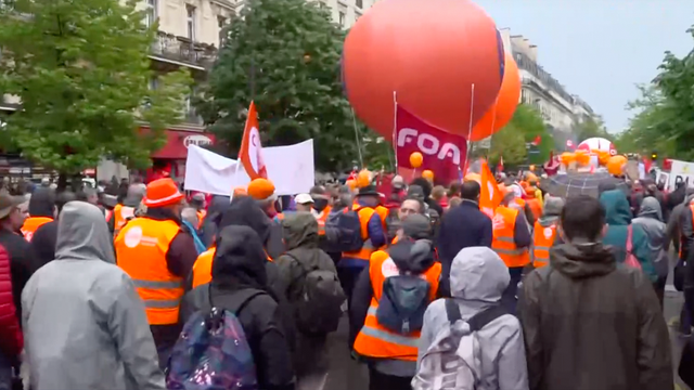 <p>Watch live: Thousands gather on streets of Paris for May Day pension protests</p>
