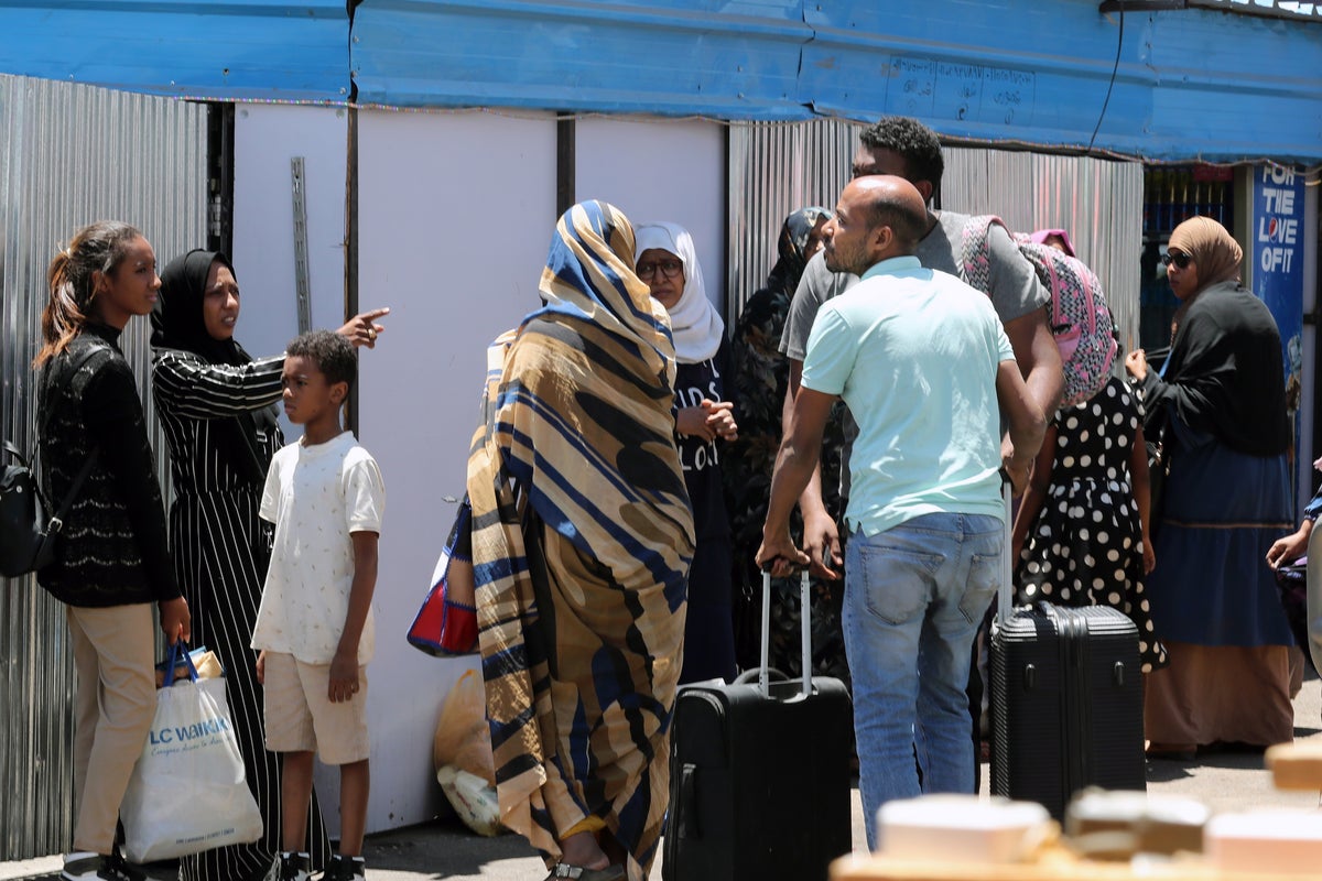 Final evacuation flight for fleeing Britons leaves as violence resumes - live