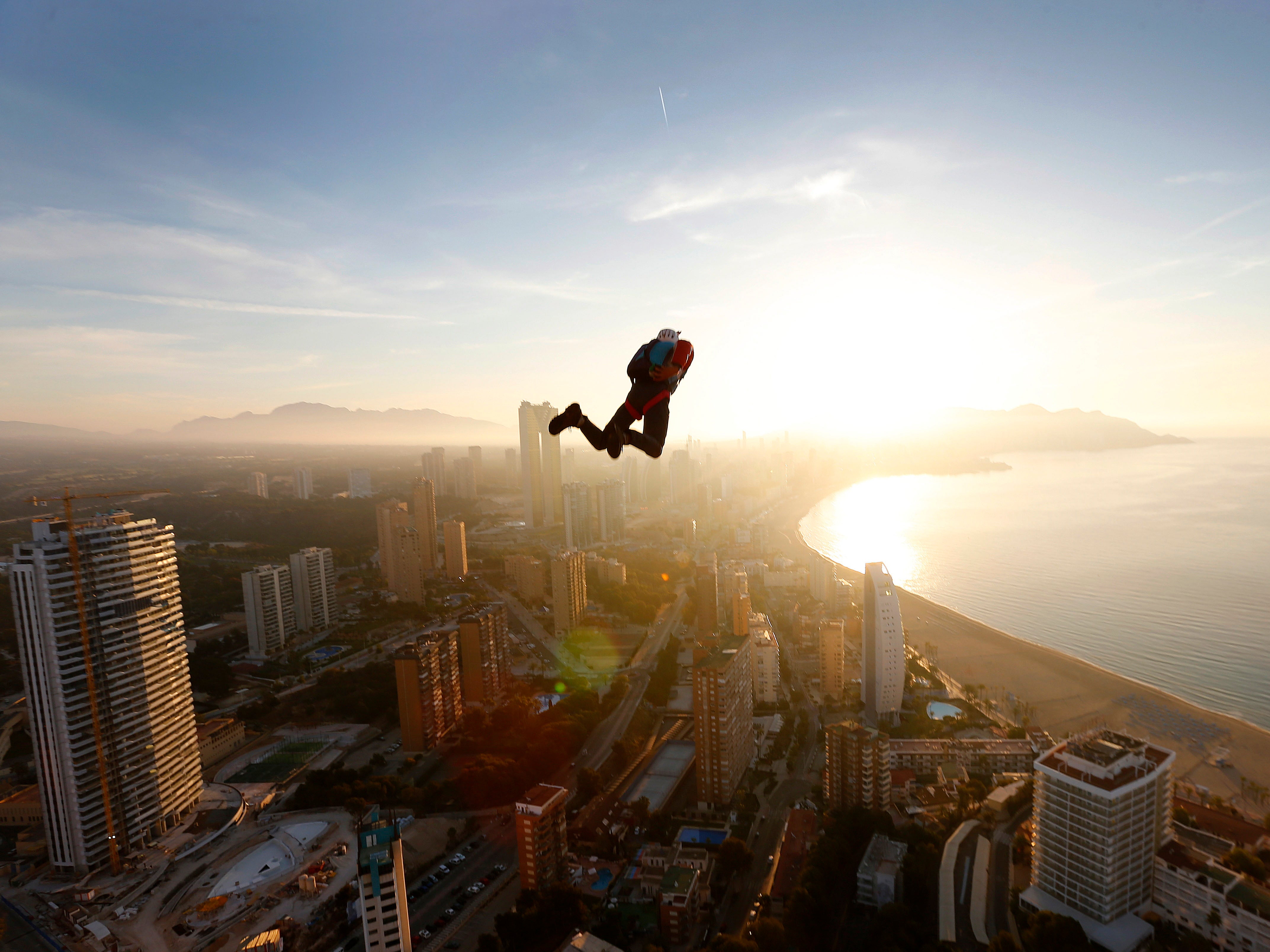 A base jumper in action during the BASE Jump Extreme World Championship at Gran Hotel Bali in Benidorm, Spain