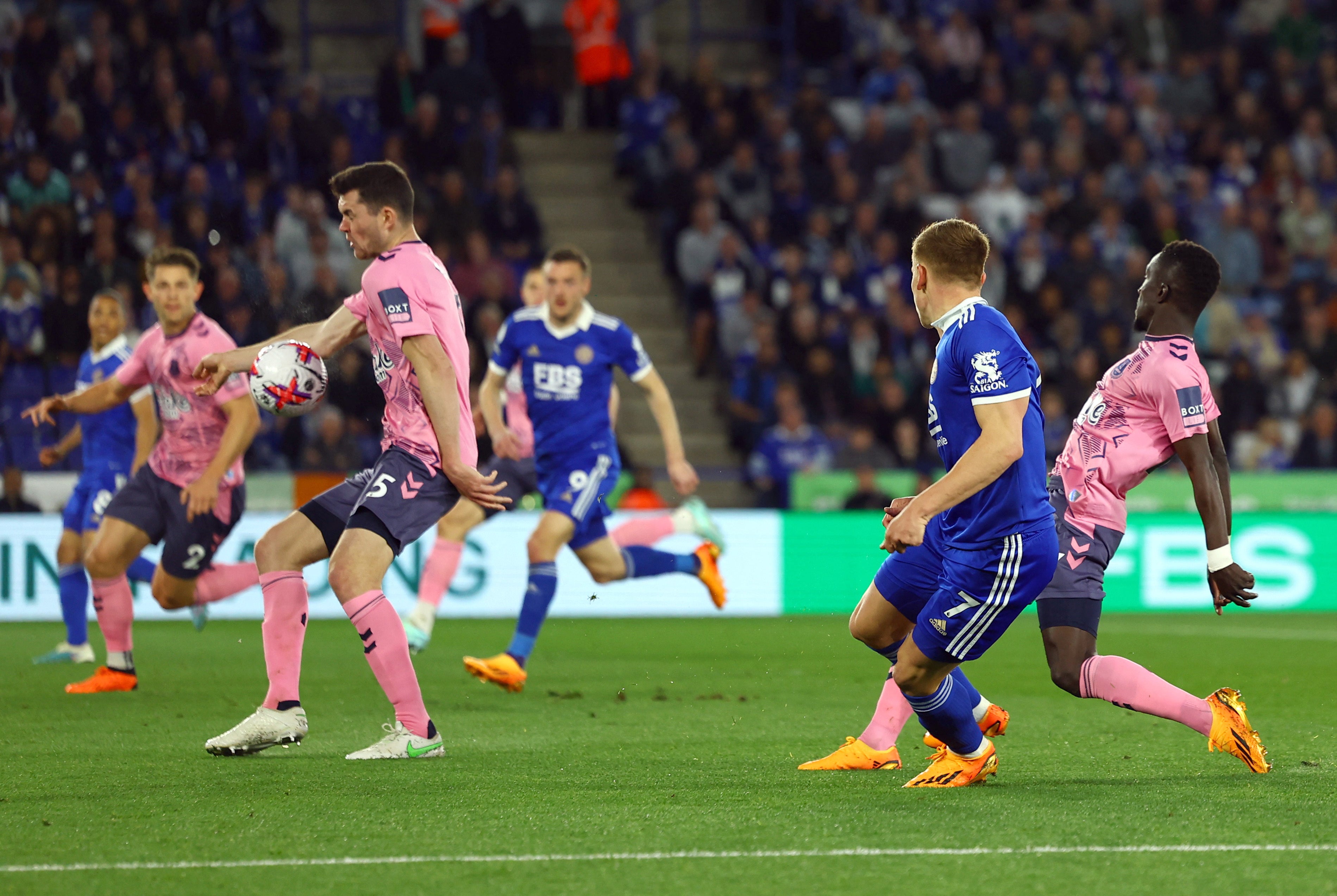 Everton defender Michael Keane handles the ball to concede a penalty