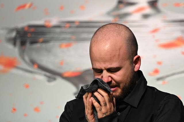 <p>Luca Brecel weeps after winning the Snooker World Championship</p>