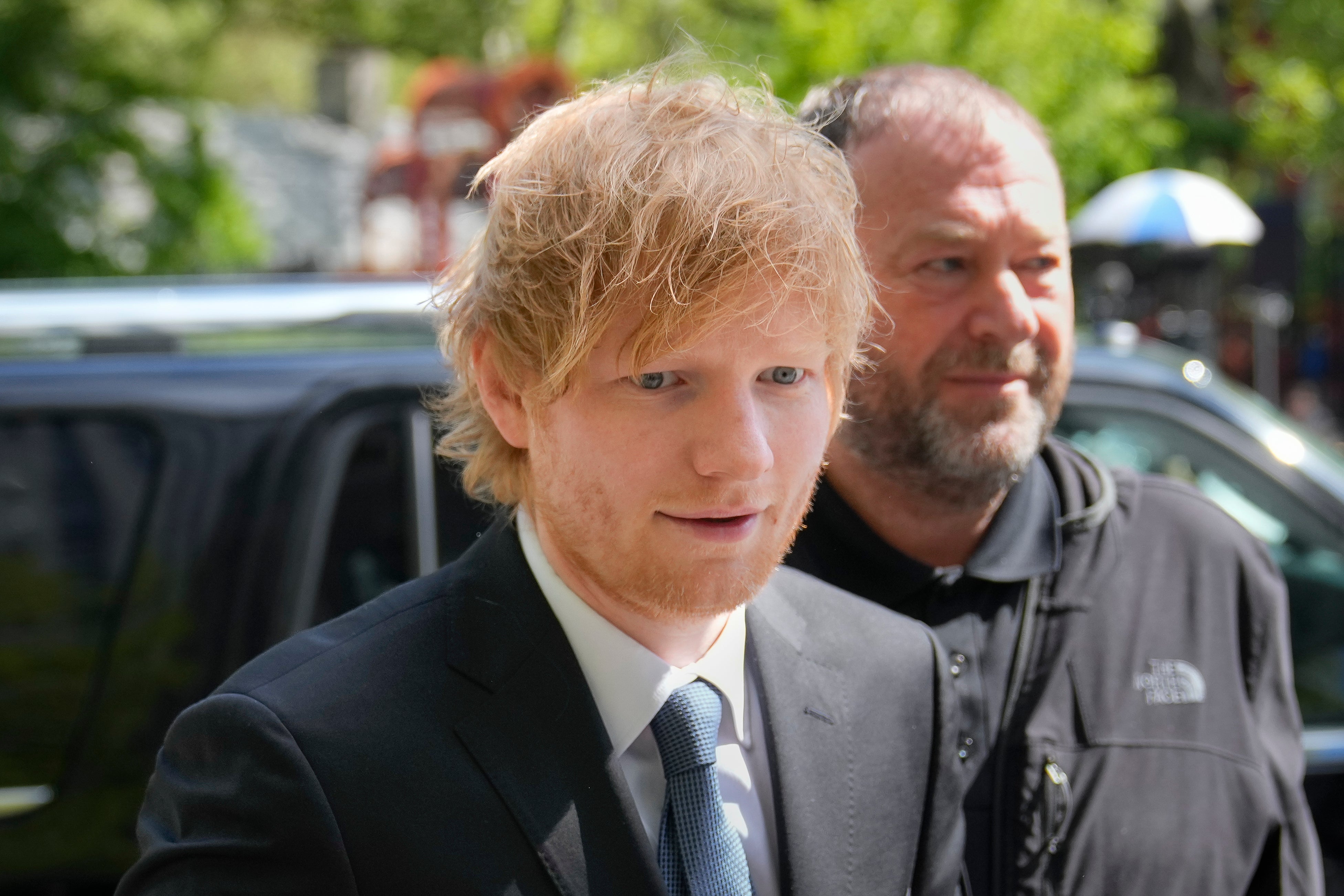 Ed Sheeran hugs lawyers after winning Marvin Gaye plagiarism lawsuit