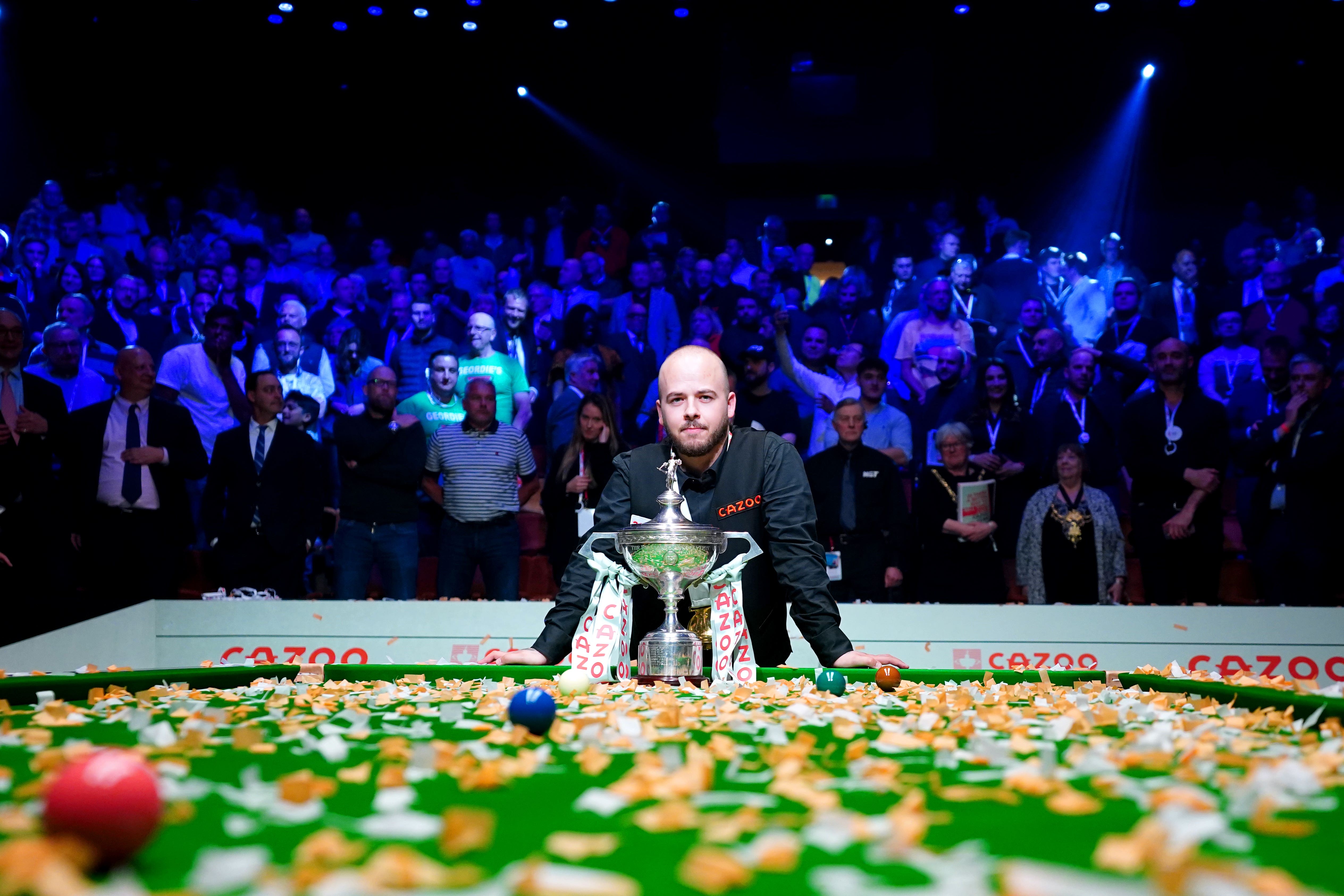 Luca Brecel insists he is not going to go wild as he celebrates Crucible win The Independent