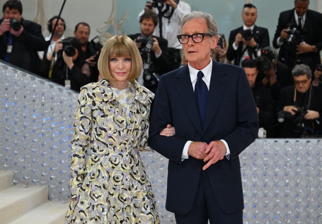 <p>Vogue supremo Anna Wintour and dapper actor Bill Nighy arm in arm at the Met Gala 2023  </p>