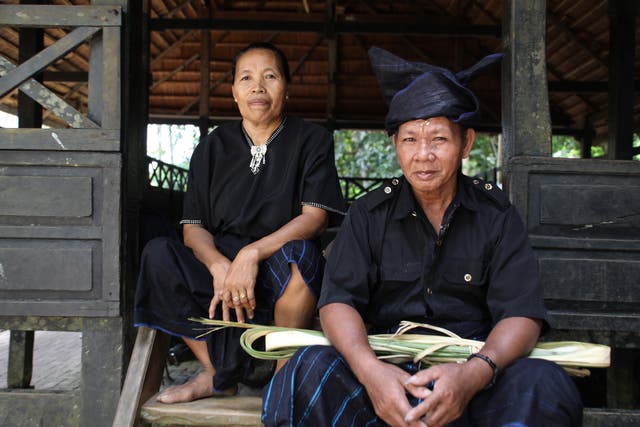 <p>A Kajang couple after attending Andingingi, an annual ritual to ask the forest for forgiveness for humanity’s sins </p>