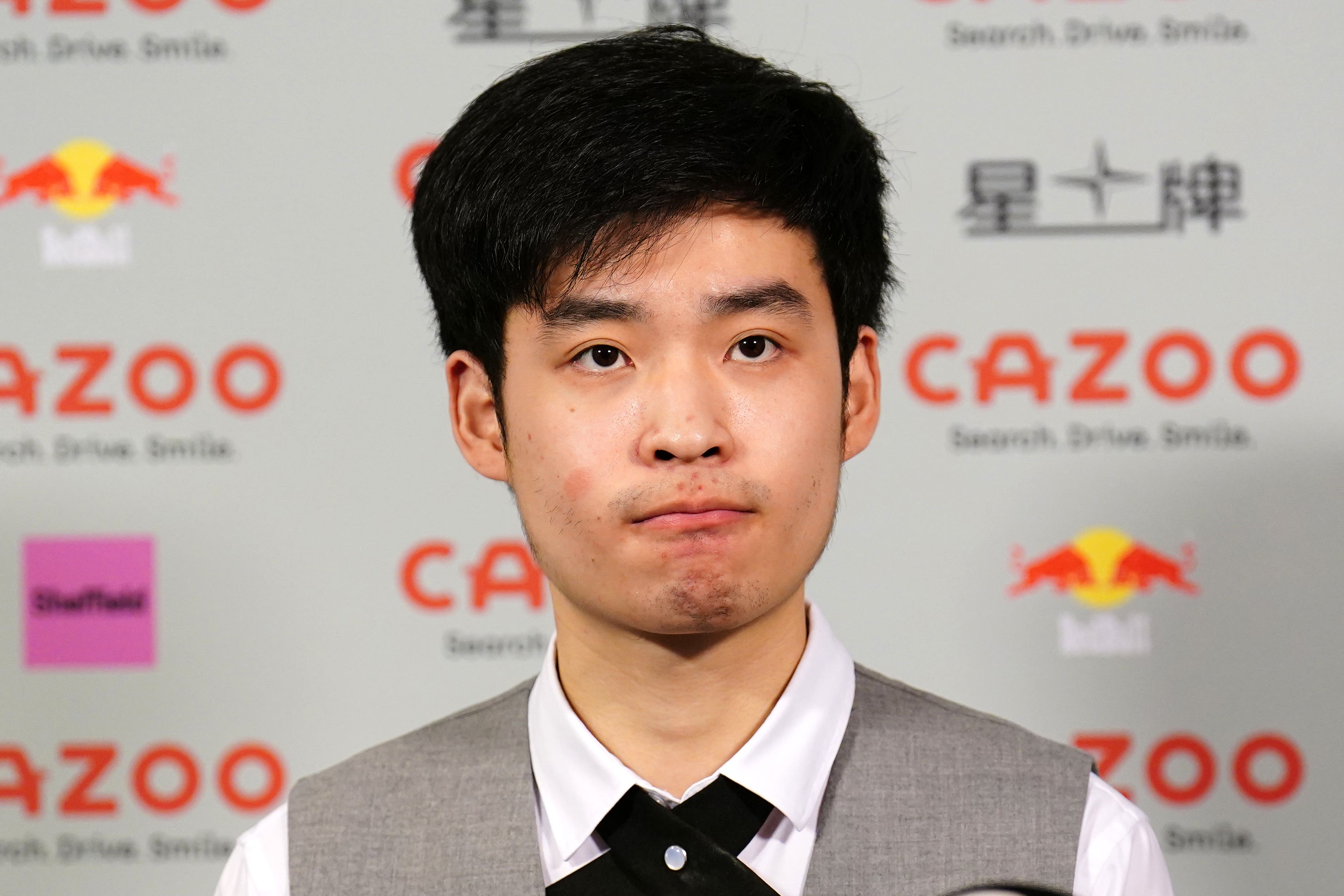 Si Jiahui speaks to the media after losing to Luca Brecel at the Crucible (Zac Goodwin/PA)