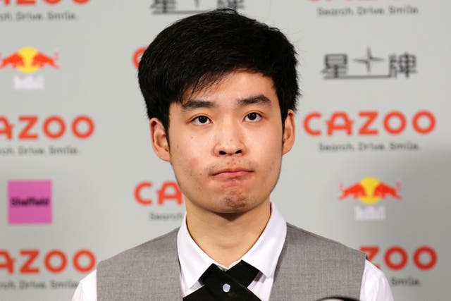 Si Jiahui speaks to the media after losing to Luca Brecel at the Crucible (Zac Goodwin/PA)