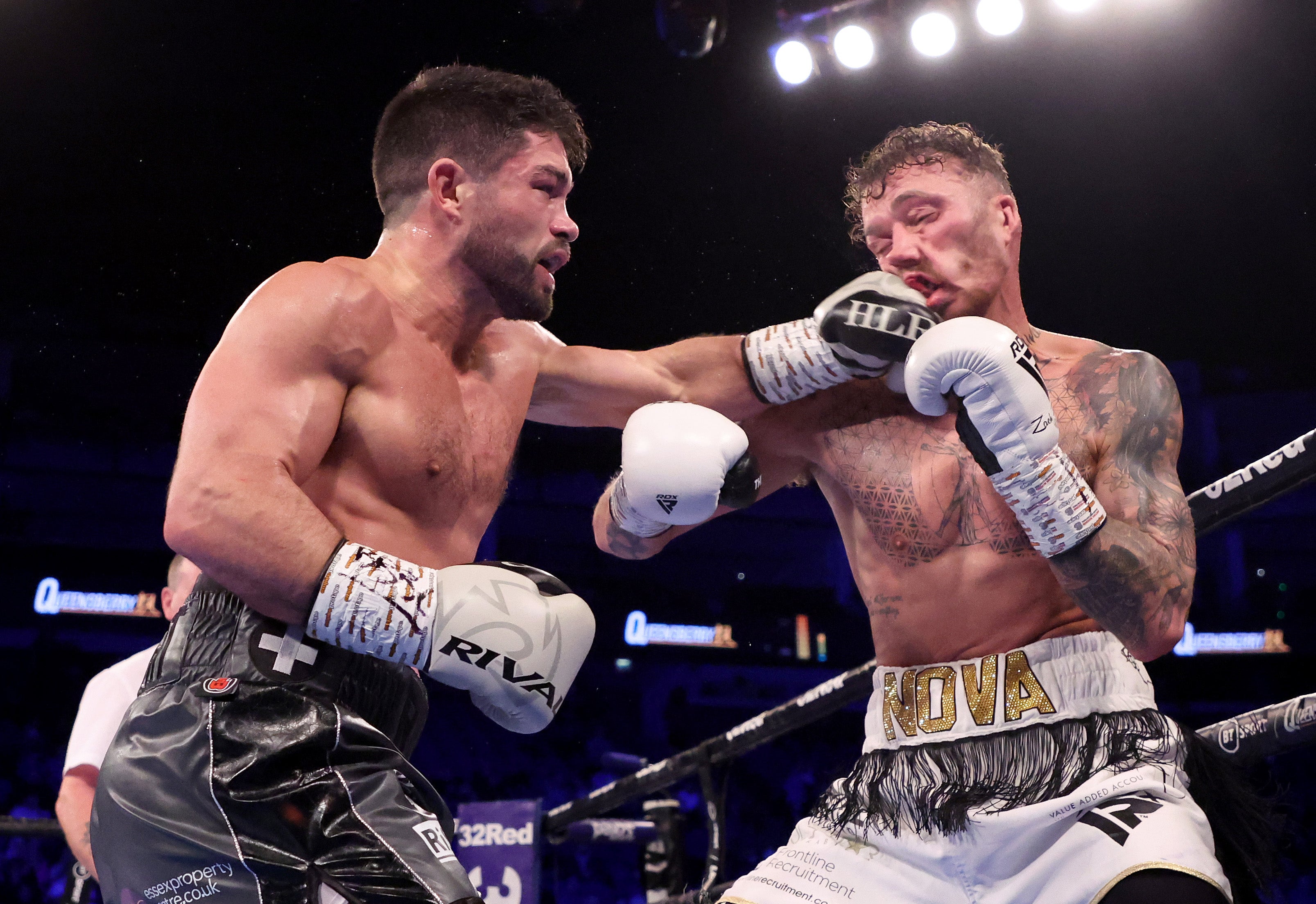 Zach Parker (right) retired from his fight with Ryder after suffering a broken hand