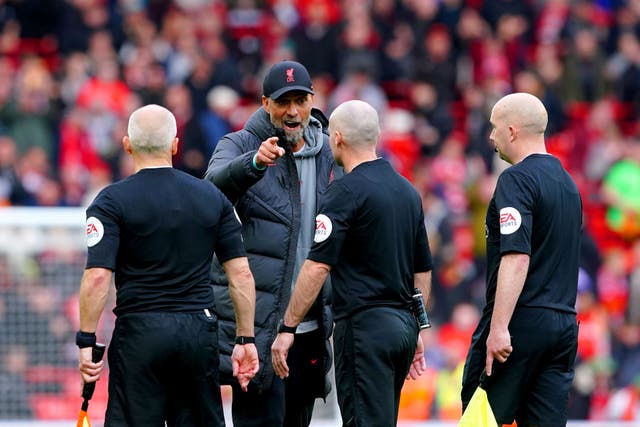 Liverpool manager Jurgen Klopp speaks to match officials at the end of the Tottenham match (Peter Byrne/PA)