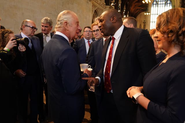 The King speaks to shadow foreign secretary David Lammy during his visit to Westminster Hall (Arthur Edwards/The Sun/PA)