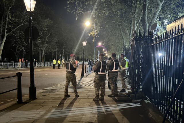 The scene outside Buckingham Palace, London, where a man has been arrested after throwing suspected shotgun cartridges into the palace grounds. Picture date: Tuesday May 2, 2023.