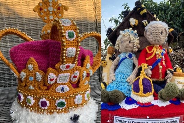 A crocheted crown and postbox topper of Charles and Camilla (Judit Kocsis-Barna/The Secret Society of Hertford Crafters/PA)