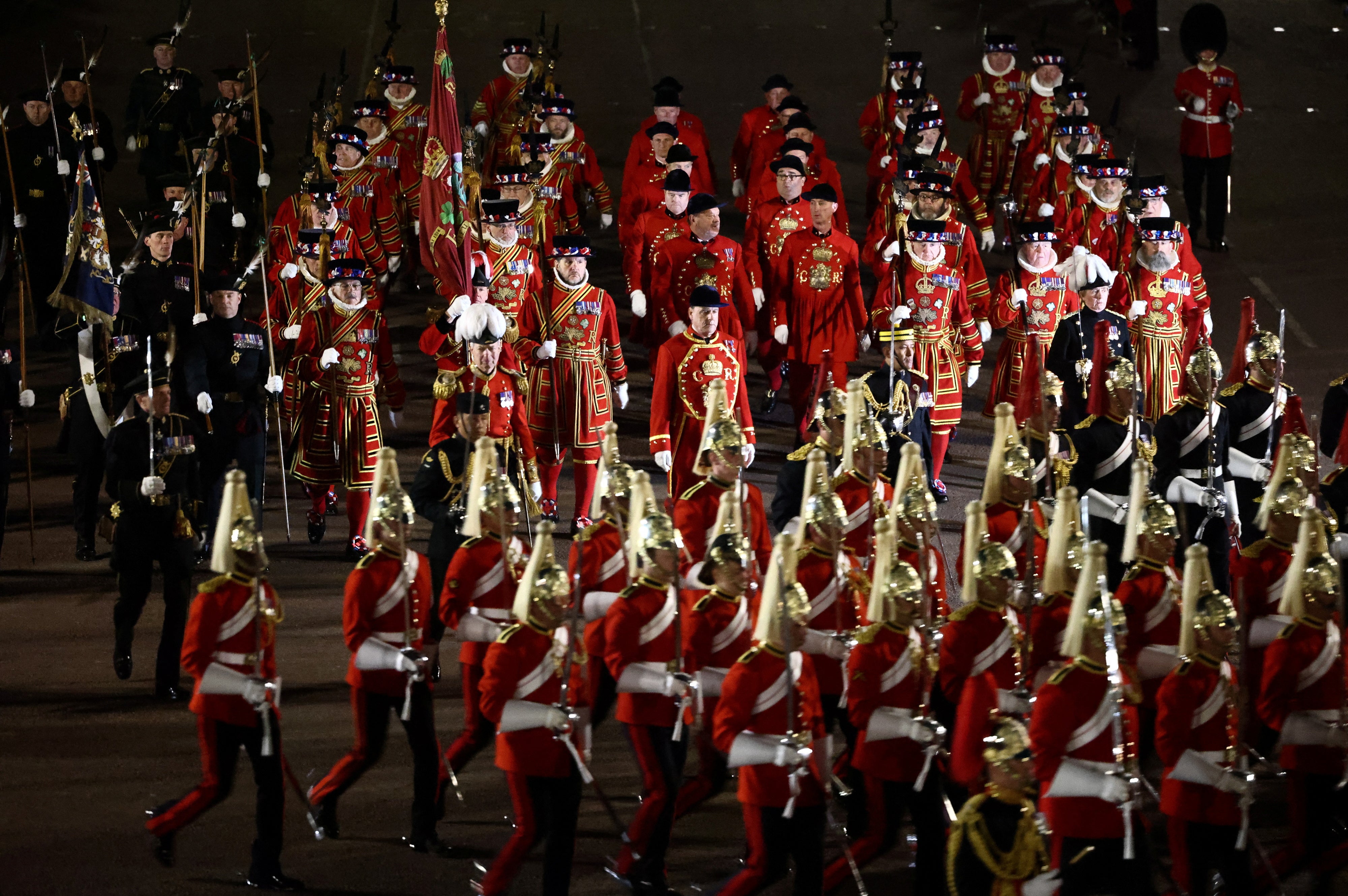 Members of the military take part in a full overnight dress rehearsal of the coronation ceremony