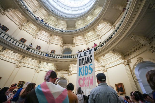 <p>Equality Texas leadership drops a banner in the Capitol rotunda reading "let trans kids grow up" as LGBTQ rights activists protest  in the rotunda at the Capitol of Texas, Tuesday, May 2, 2023</p>