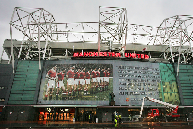 <p>Old Trafford adorned with a tribute to the Busby Babes</p>