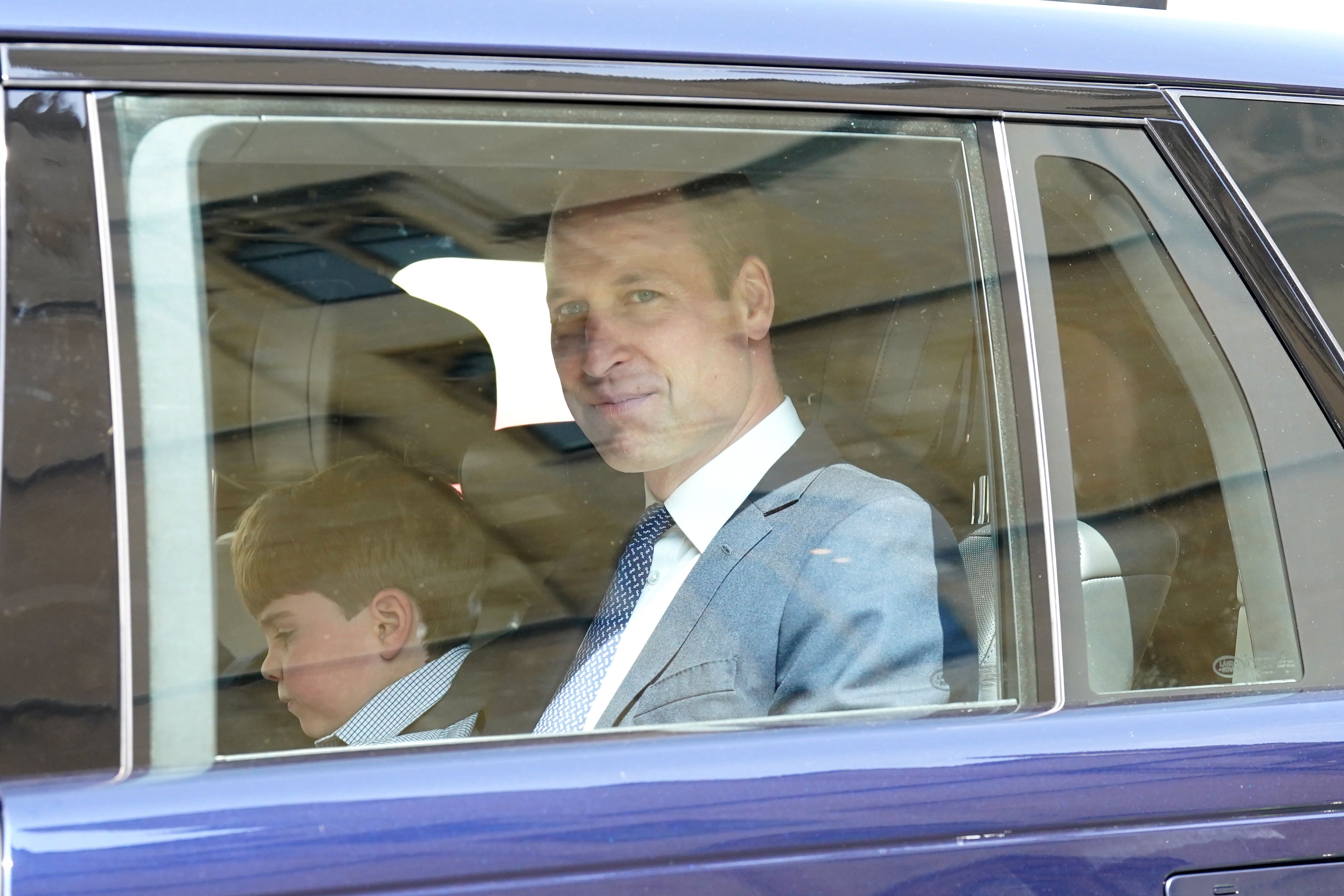 Prince Louis and the Prince of Wales leaving Westminster Abbey in central London following a rehearsal for the King’s coronation (Stefan Rousseau/PA)