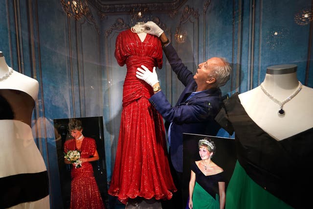 The late princess’s scarlet Bruce Oldfield gown is expected to sell for between 200,000 US dollars and 400,000 US dollars (Brian Lawless/PA)
