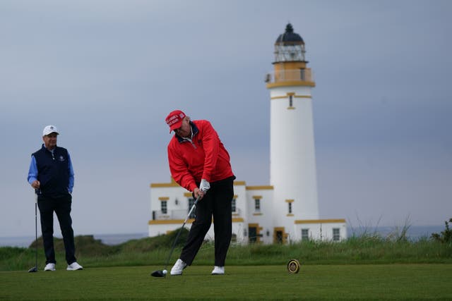 Former US president Donald Trump playing golf at his Trump Turnberry course in South Ayrshire (Andrew Milligan/PA)
