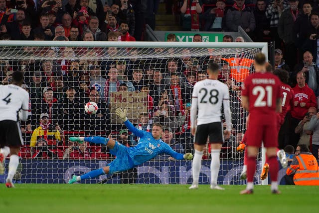 <p>Liverpool’s Mohamed Salah scores their side’s first goal of the game from the penalty spot past Fulham goalkeeper Bernd Leno during the Premier League match at Anfield, Liverpool. Picture date: Wednesday May 3, 2023.</p>