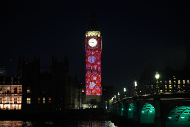 Images are projected onto Big Ben during a rehearsal on Wednesday evening (Yui Mok/PA)