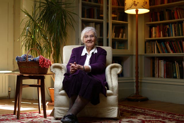 <p>Pamela Tawse, 88, poses for a photograph in the library room of the Hawkwood Centre for Future Thinking in Stroud</p>