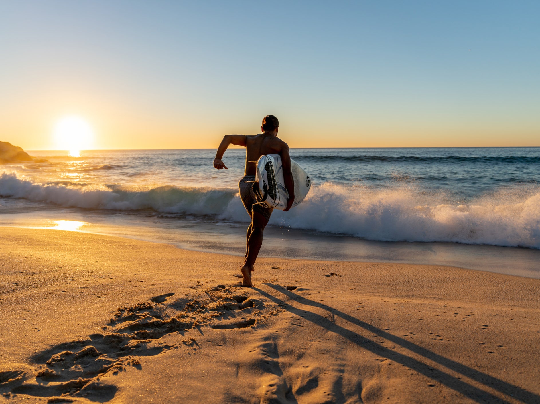 A company is seeking to entice NHS doctors to Australia with the promise of 20 days off each month to ‘travel and surf'