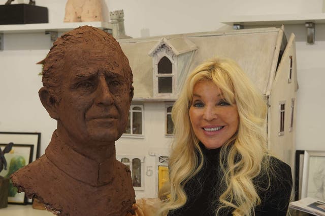 Frances Segelman with the clay of her King sculpture (Andy Kelleher/PA)