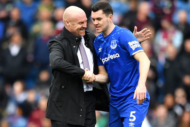 Sean Dyche, left, said he retains full faith in Michael Keane despite criticism of the defender’s performances (Anthony Devlin/PA)