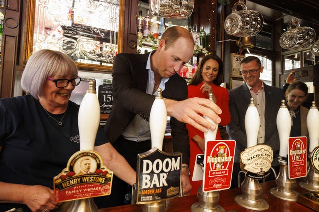 The Prince of Wales pulls the first pint of Kingmaker (Jamie Lorriman/Daily Telegraph/PA)