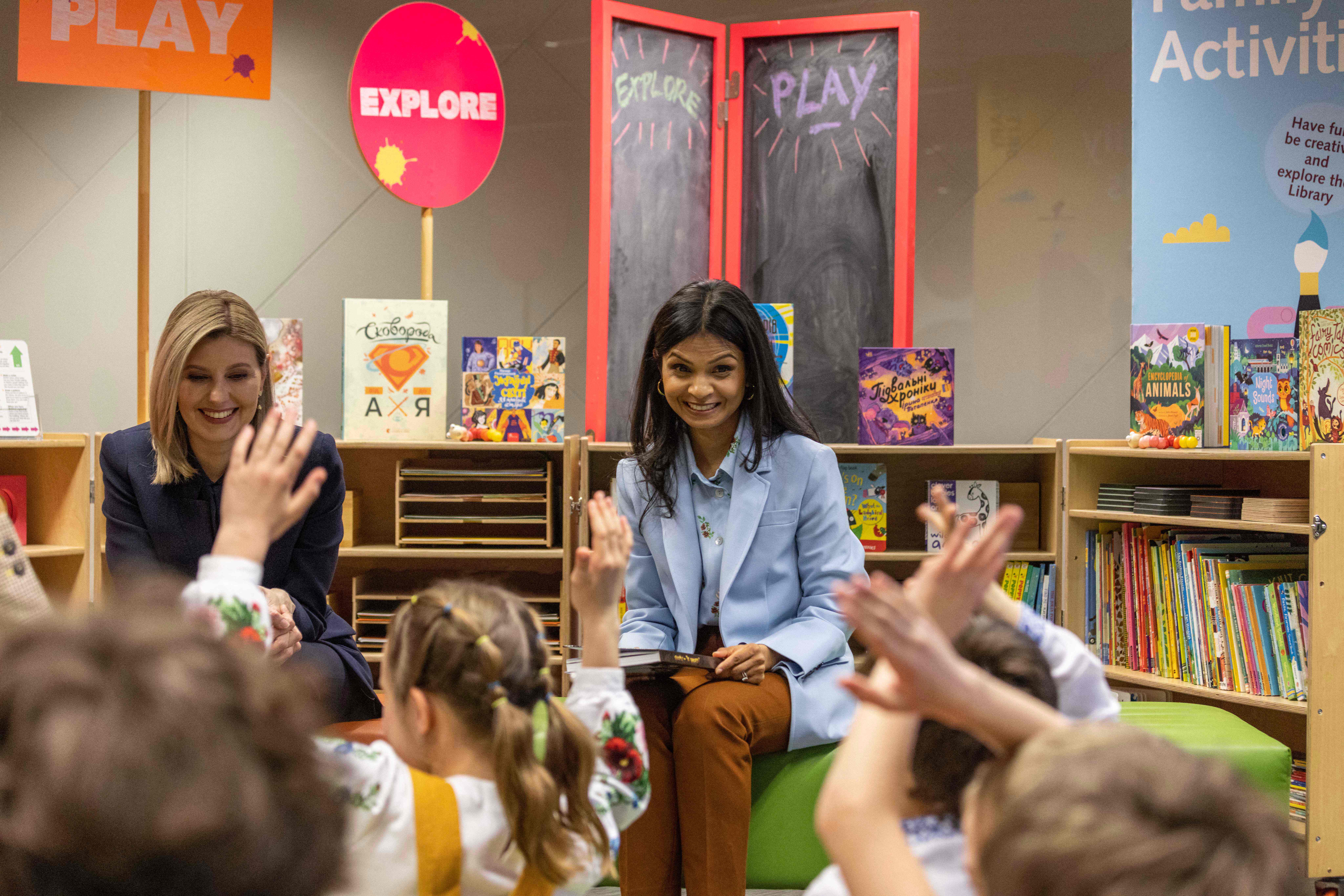 Akshata Murty and Ukraine's first lady Olena Zelenska read to Ukrainian children during a visit to the British Library in central London