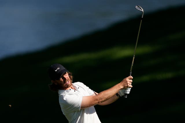 Tommy Fleetwood, of England, hits from the fairway on the 15th hole during first round of the Wells Fargo Championship golf tournament at the Quail Hollow Club (Chris Carlson/AP)