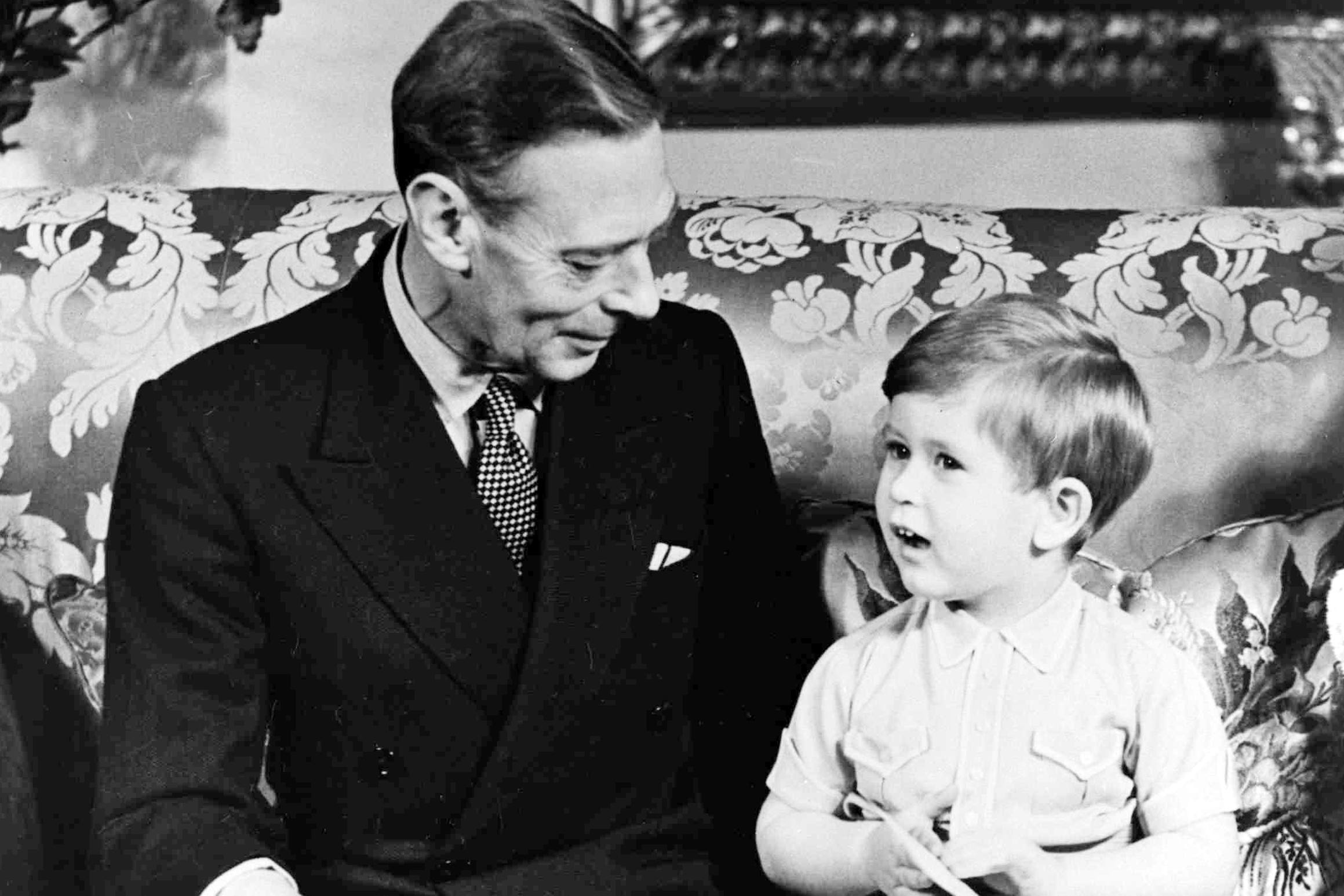 King George VI with his grandson Charles in 1951 (PA)