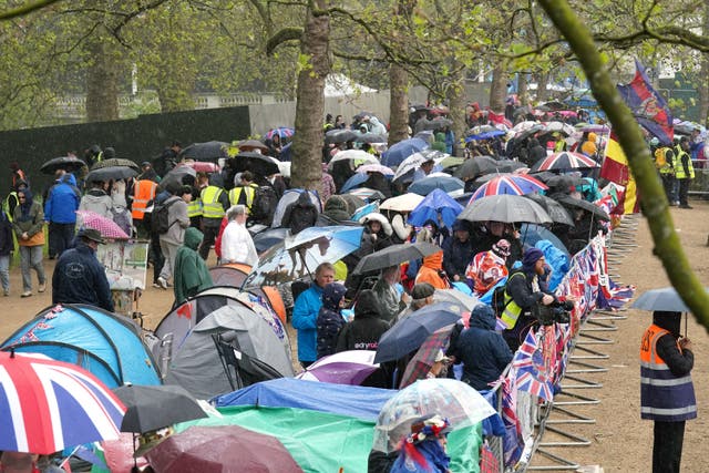 Royal fans in London are advised to bring umbrellas (James Manning/PA)