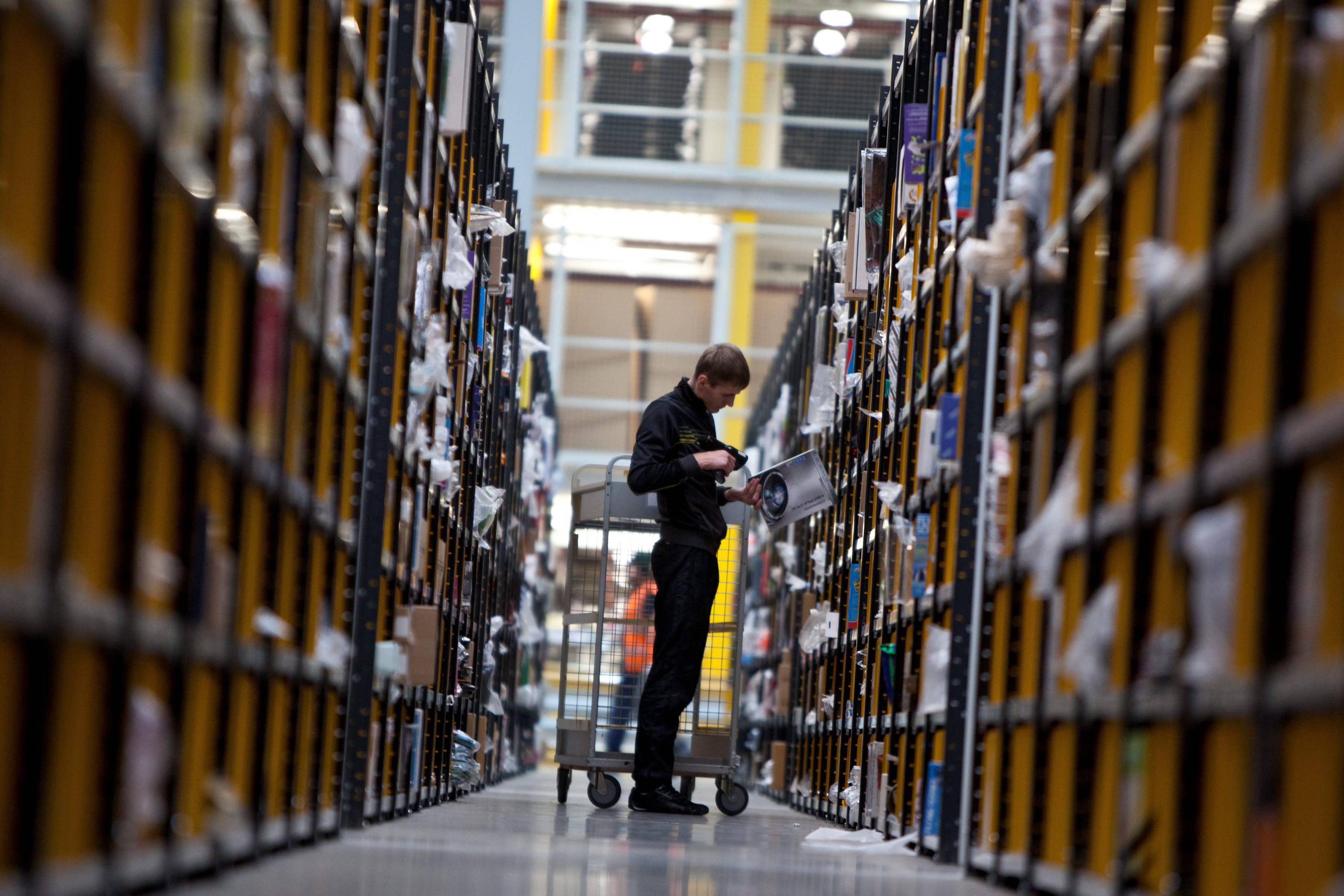 Amazon workers are to be balloted on industrial action (Alamy/PA)