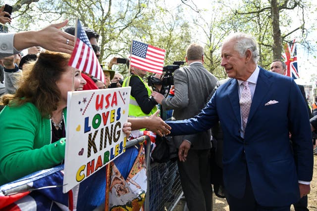 The King goes on a walkabout on The Mall to greet well wishers (Toby Melville/PA)