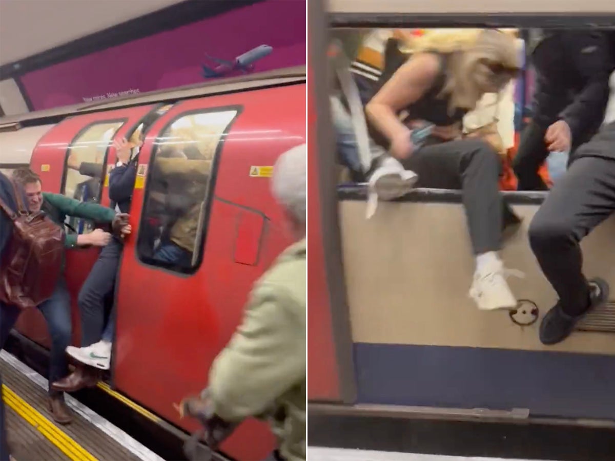London Tube passengers forced to smash their way out as carriage fills with smoke